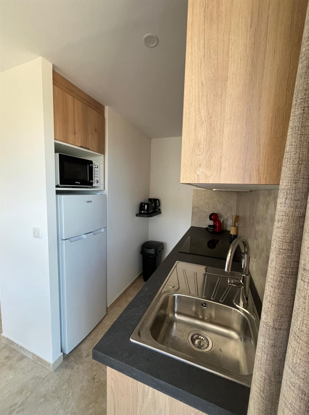 La cuisine équipée de l'appartement Le Mercantour